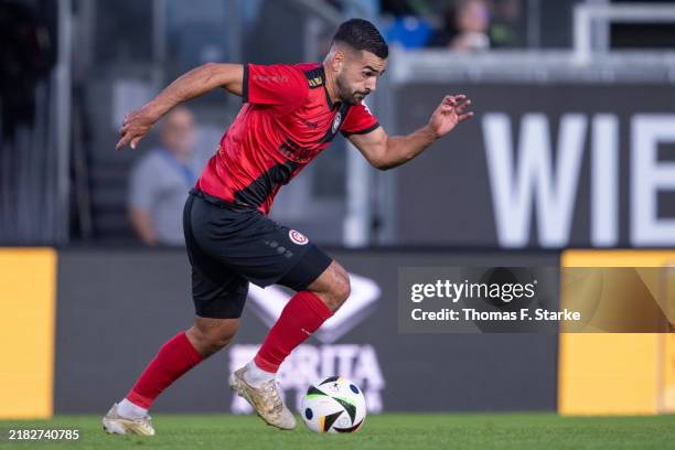 Tarik Goezuesirin of Wiesbaden runs with the ball during the 3. Liga match between SV Wehen Wiesbaden and Arminia Bielefeld at BRITA-Arena on...