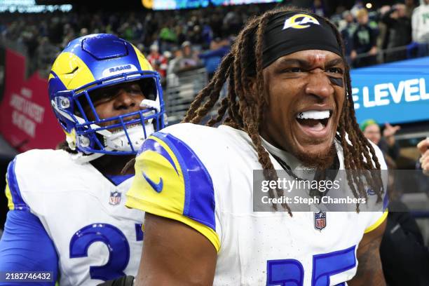 Demarcus Robinson of the Los Angeles Rams celebrates with teammates after catching the game-winning touchdown to beat the Seattle Seahawks 26-20 in...