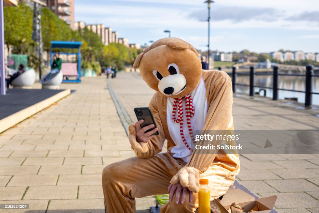 Teddy Bear Checking Messages on Smartphone