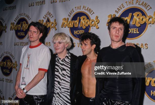 Bass guitarist John Taylor, keyboardist Nick Rhodes, guitarist Warren Cuccurullo and singer Simon Le Bon of the British rock group Duran Duran pose...