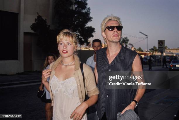 British musician John Taylor and British television presenter Amanda De Cadenet attend the Hollywood Premiere of Allison Anders' 'Mi Vida Loca' at...