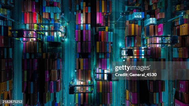 aerial top view container cargo ship in terminal port at night. - shipping container top view - fotografias e filmes do acervo