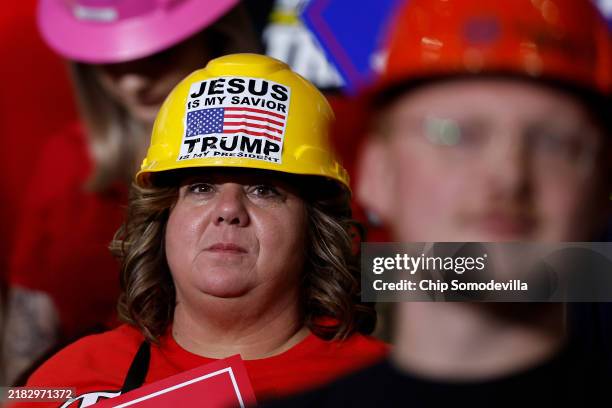 Supporters of Republican presidential nominee, former President Donald Trump attend a campaign rally at PPG Paints Arena on November 04, 2024 in...