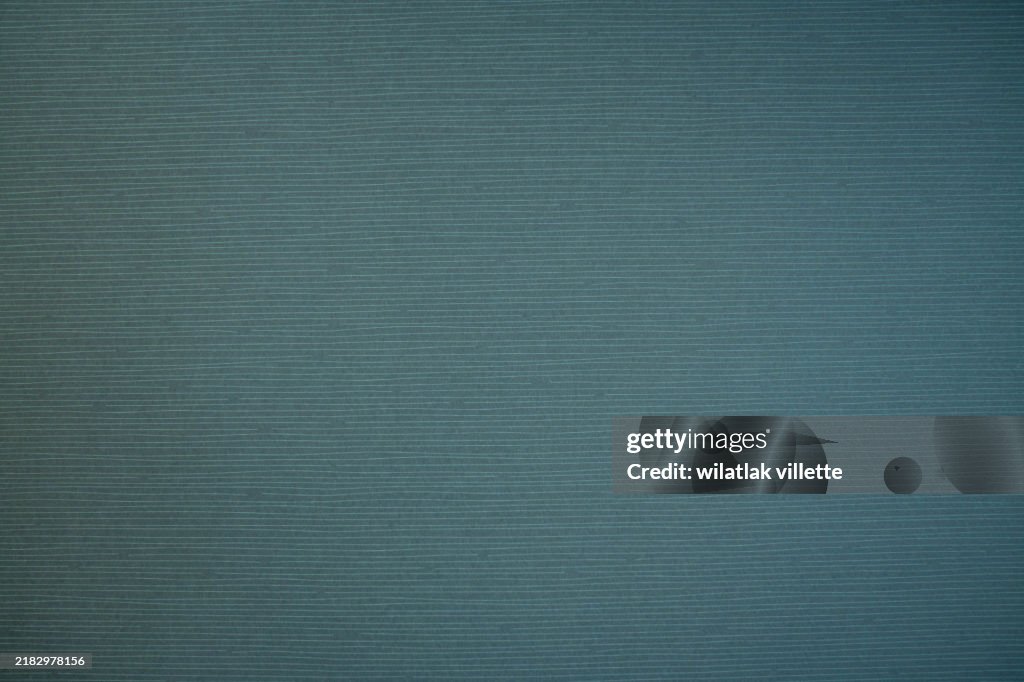 Green paper background.