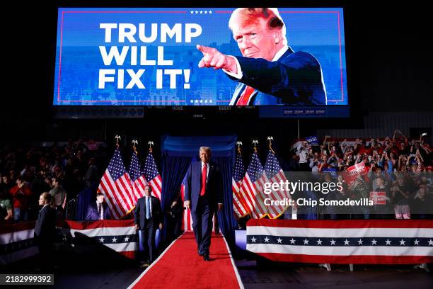 Republican presidential nominee, former U.S. President Donald Trump, takes the stage for his last rally of the election year at Van Andel Arena on...