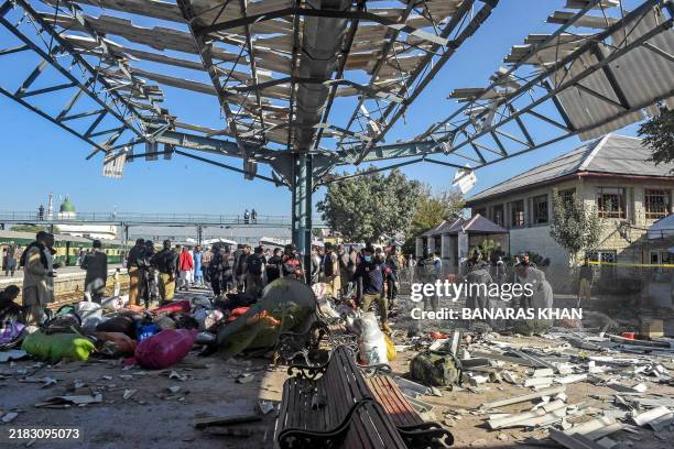 Passengers' belongings are seen scattered on the platform after an explosion at a railway station in Quetta, in Pakistan's Balochistan province, on...