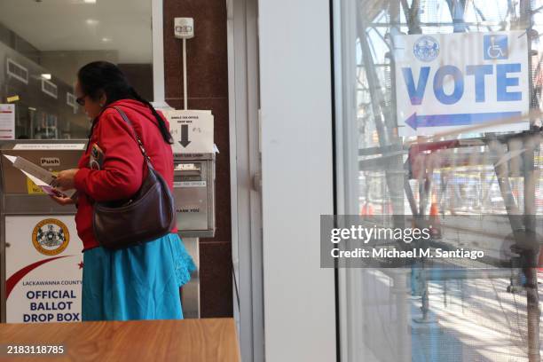 Voters drop off ballots on Election Day at Lackawanna County Government Center on November 05, 2024 in Scranton, Pennsylvania. Americans cast their...