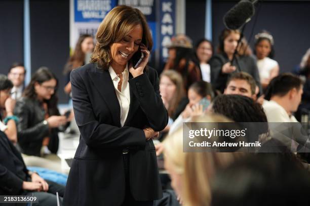 Democratic presidential nominee Vice President Kamala Harris drops by phone bank event at the Democratic National Committee headquarters on Election...