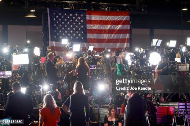 Members of the media cover the election night watch party for Republican presidential nominee former President Donald Trump at the Palm Beach County...