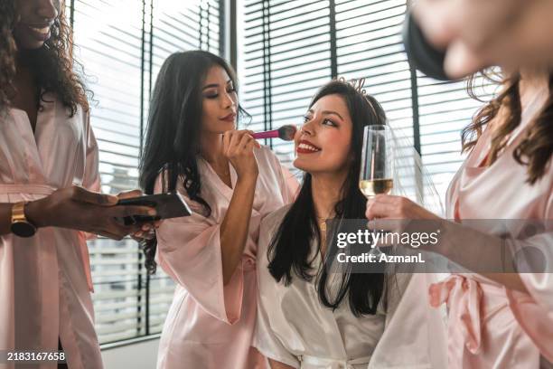 bridal squad's bachelorette fun - bridal make up stock pictures, royalty-free photos & images