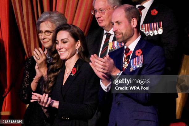 Britain's Catherine, Princess of Wales and Prince William, Prince of Wales attend the Royal British Legion Festival of Remembrance at the Royal...