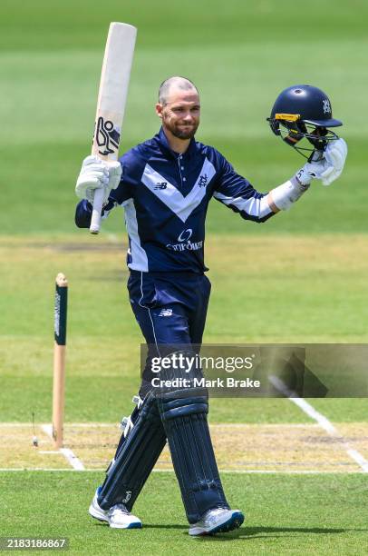 Peter Handscomb of Victoria celebrates bringing up his century during the ODC match between South Australia and Victoria at Karen Rolton Oval, on...