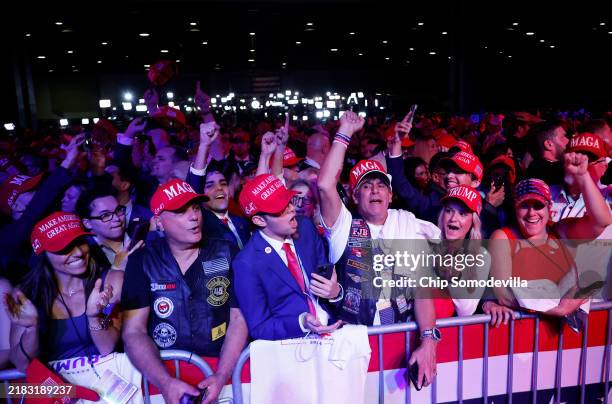 Supporters react while watching returns come in during an election night watch party for Republican presidential nominee, former U.S. President...