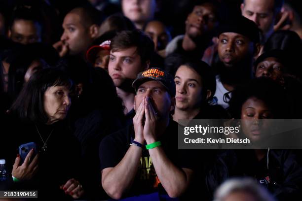 Supporters watch returns come in during an election night event for Democratic presidential nominee, U.S. Vice President Kamala Harris at Howard...