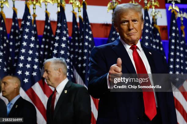 Republican presidential nominee, former U.S. President Donald Trump arrives to speak during an election night event at the Palm Beach Convention...