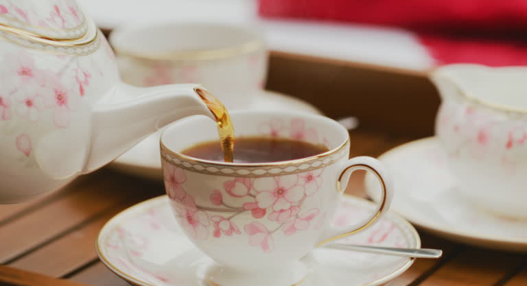 https://media.gettyimages.com/id/2183244136/video/tea-in-a-classic-english-setting.jpg?b=1&s=640x640&k=20&c=8bh8eXJvx8sPRETa4z57KItGmptHZjkNDg9cbAZltdM=