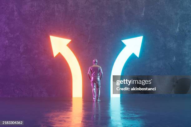 choices concept with neon arrows in dark room - alternativ bildbanksfoton och bilder