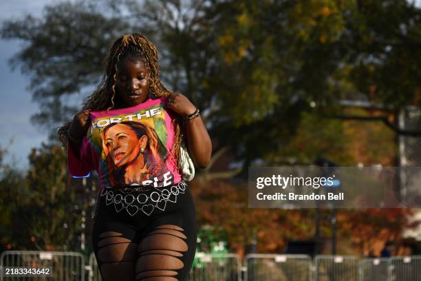 Supporter waits to hear Democratic presidential nominee, U.S. Vice President Kamala Harris speak on stage as she is expected to concede the election,...
