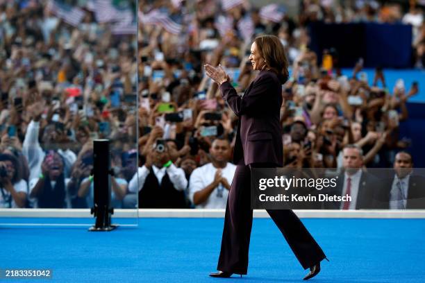 Democratic presidential nominee, U.S. Vice President Kamala Harris arrives to speak on stage as she concedes the election, at Howard University on...