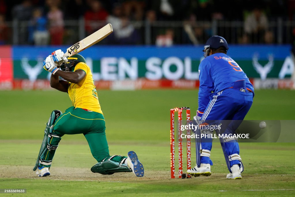 India's wicketkeeper Sanju Samson reacts as South Africa's Andile ...