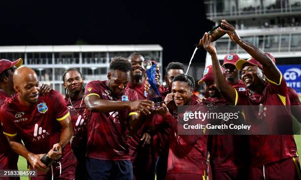 West Indies celebrate with the series trophy after winning the 3rd One Day International between the West Indies and England at Kensington Oval on...
