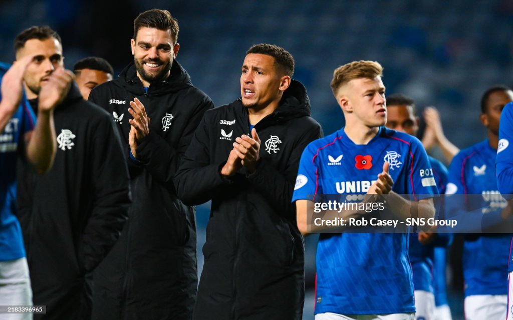 Baron Rengers Rangers' Robin Propper, James Tavernier and Connor Barron applaud ...