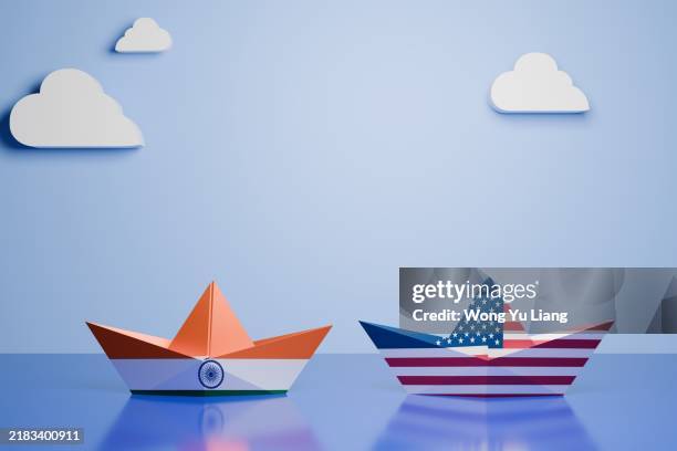 india usa trade war with paper boat , tariff concept - trade war stock pictures, royalty-free photos & images