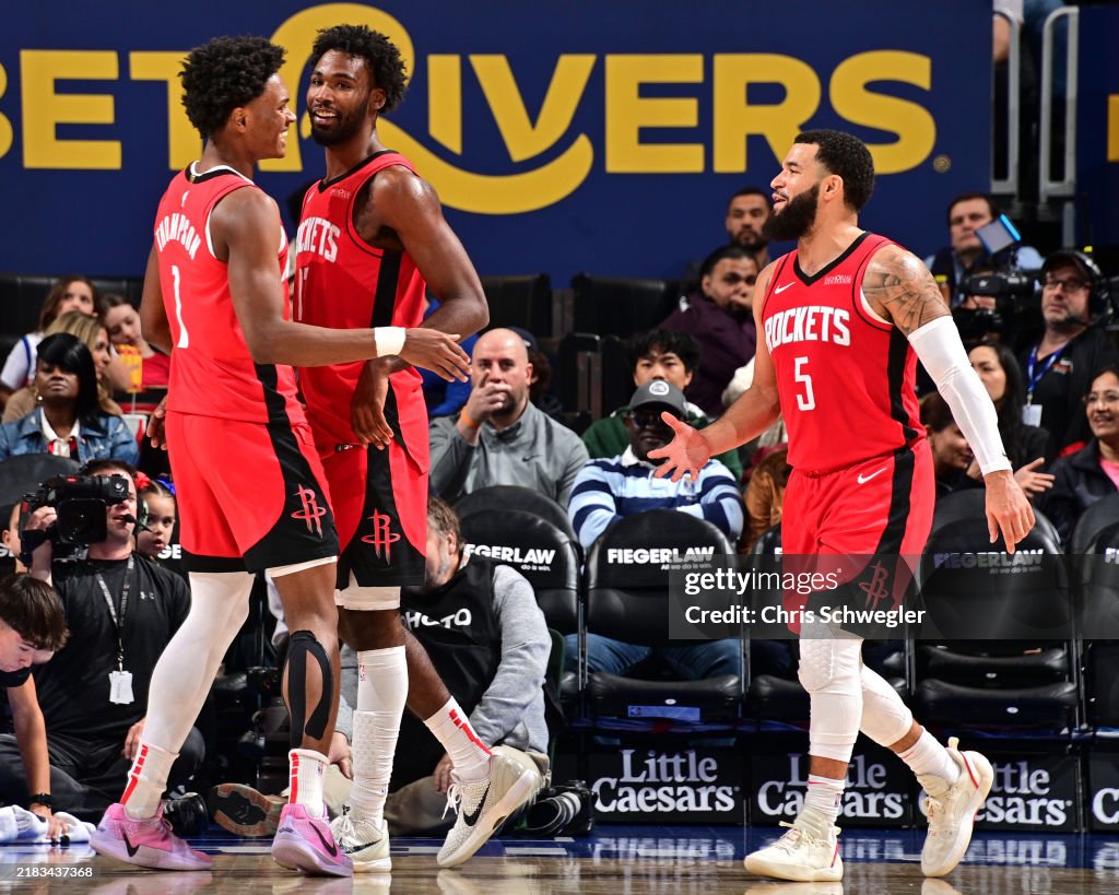Houston Rockets Thompson Amen Thompson of the Houston Rockets high fives Fred VanVleet during ...