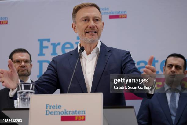 Christian Lindner, leader of the Free Democratic Party , is flanked by outgoing Justice Minister Marco Buschmann and FDP Secretary General Bijan...