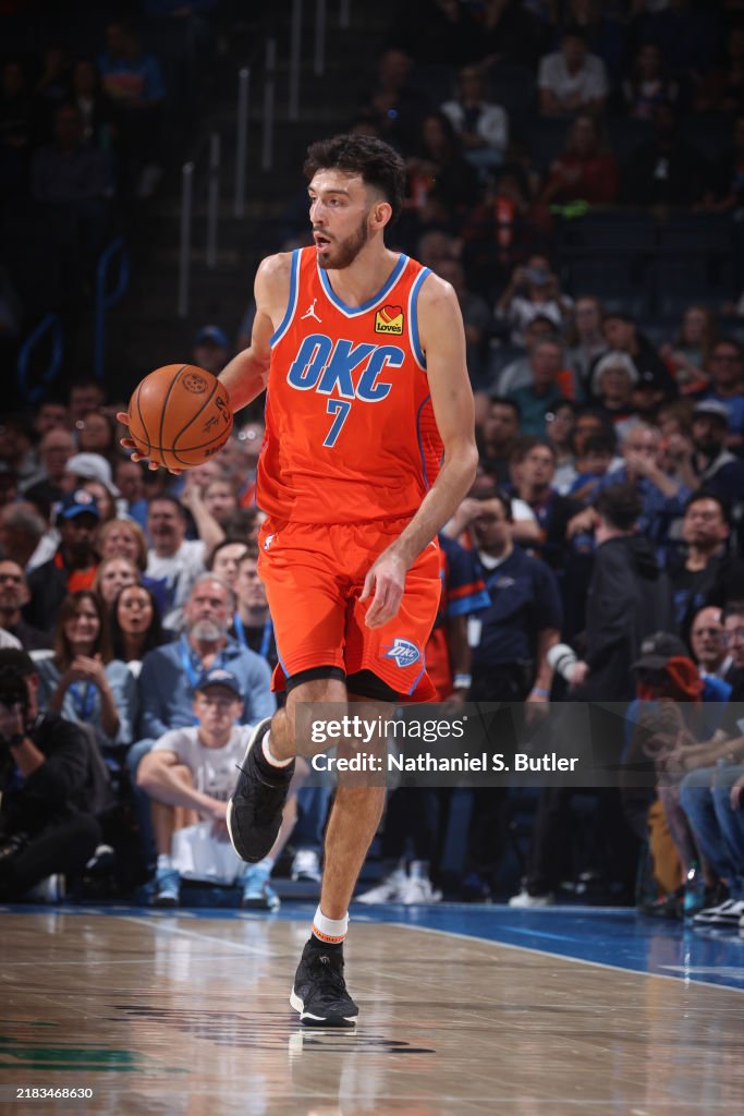 Chet Chet Holmgren of the Oklahoma City Thunder dribbles the ball during ...