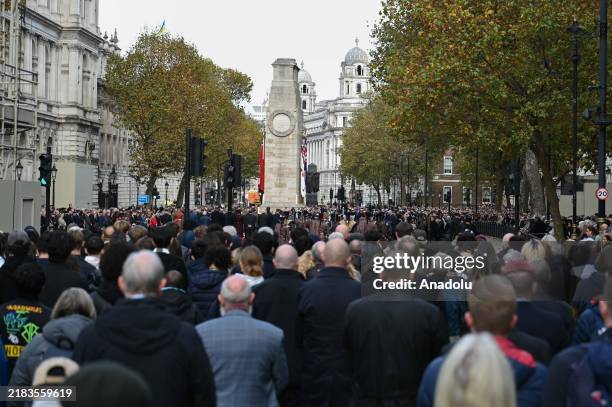 People stand in silence during the Remembrance Day, which commemorates armistice agreement that ended the First World War and those who lost their...