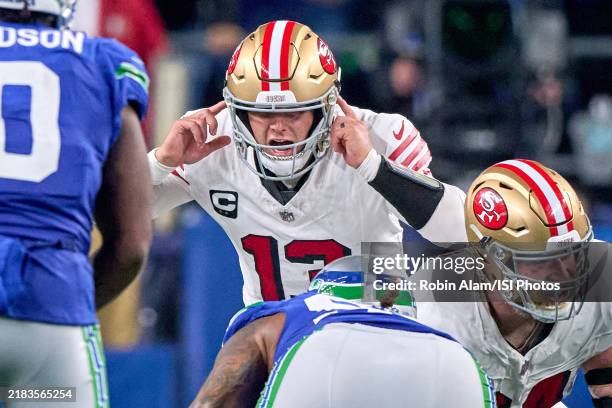 Quarterback Brock Purdy of the San Francisco 49ers signals for a play at Lumen Field on October 10, 2024 in Seattle, Washington.