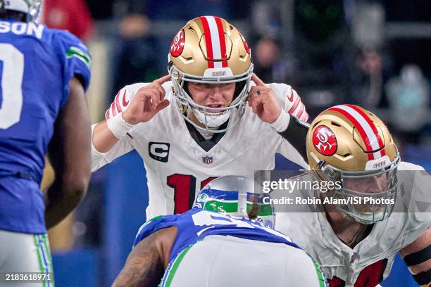Quarterback Brock Purdy of the San Francisco 49ers signals for a play at Lumen Field on October 10, 2024 in Seattle, Washington.