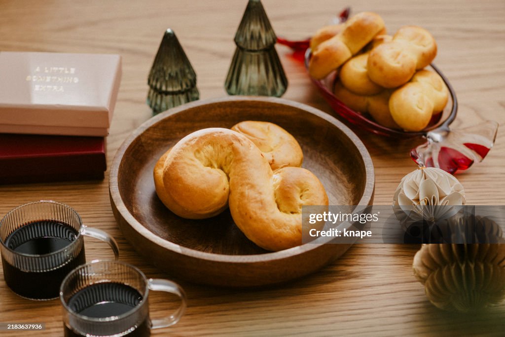 Christmas still life Lussekatt, saffronbuns christmas sweet bun