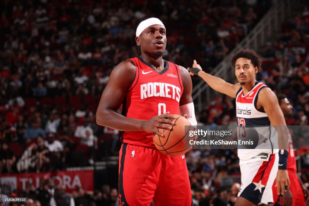 Wizards Rockets Aaron Holiday of the Houston Rockets shoots a free throw during the ...