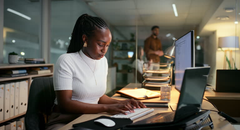 https://media.gettyimages.com/id/2183714163/video/night-office-and-businesswoman-with-computer-screen-for-typing-financial-information-and.jpg?b=1&s=640x640&k=20&c=N9I3IlyVApd1V3jSrUNaARQjcnK7n5LeY9Bs_X4vPjQ=
