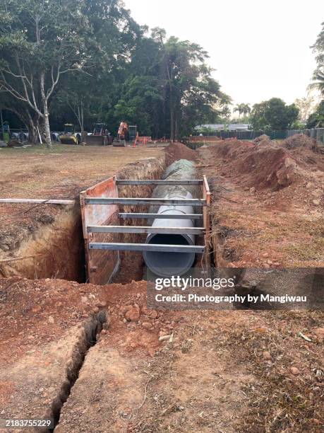 stormwater drain earthworks - stormwater stock pictures, royalty-free photos & images