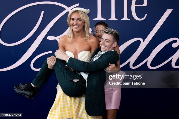 Ariarne Titmus, Robbie Dolan and Michelle Payne during 2024 Stakes Day at Flemington Racecourse on November 09, 2024 in Melbourne, Australia.