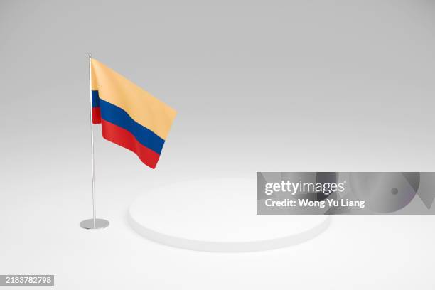 colombia flag template, on white podium - bandera colombia fotografías e imágenes de stock
