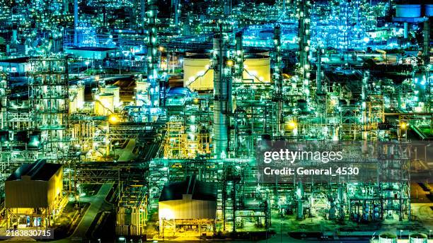 aerial view refinery plant of petrochemical industry at night. - gas refinery stock pictures, royalty-free photos & images