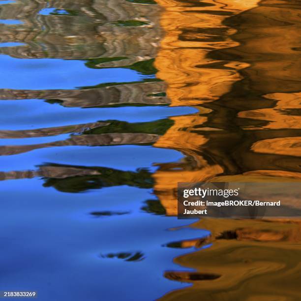 colored reflections in the water - mirror different reflection stock illustrations
