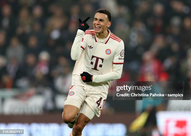 Jamal Musiala of FC Bayern Muenchen celebrates after scoring his team`s first goal during the Bundesliga match between FC St. Pauli 1910 and FC...