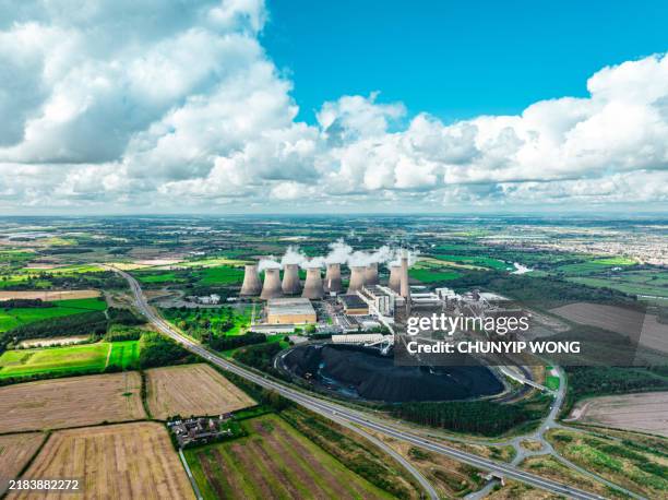 drone view of ratcliffe on soar power station in nottinghamshire - ratcliffe upon soar power station stock pictures, royalty-free photos & images