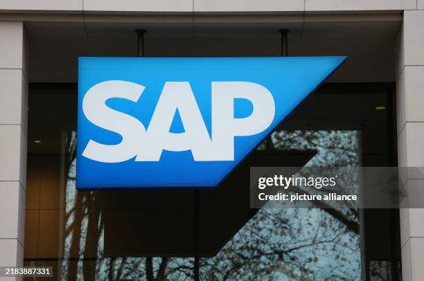 November 2024, Hamburg: The logo of the software company SAP Deutschland SE & Co. KG hangs on the façade of the company's headquarters in Hamburg....