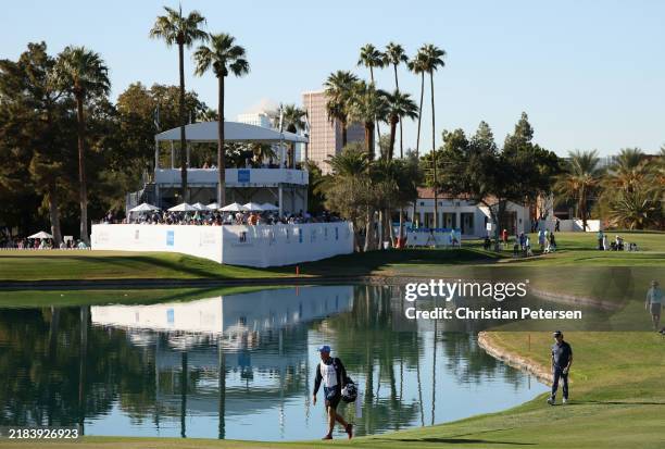 Mark Hensby of Australia walks down the 15th hole during the third round of the Charles Schwab Cup Championship 2024 at Phoenix Country Club on...