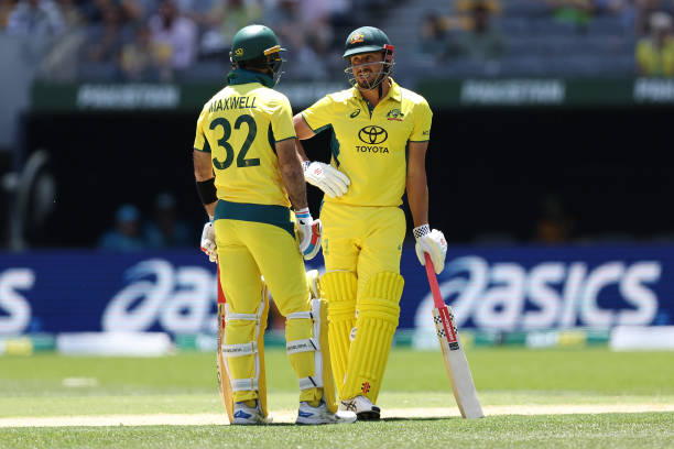 Marcus Stoinis and Glenn Maxwell of Australia talk between deliveries during game three of the Men's ODI series between Australia and Pakistan at...