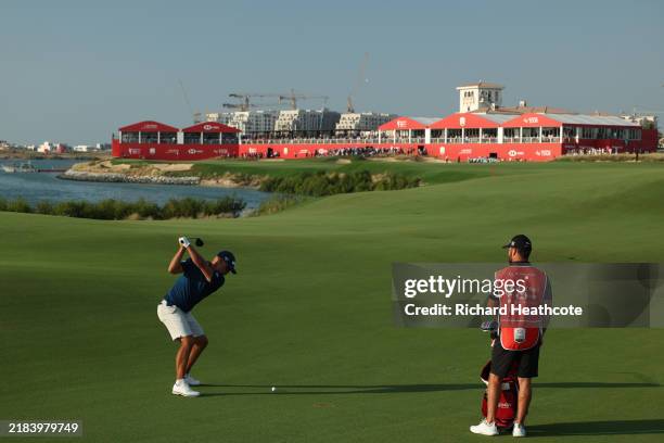 Paul Waring of England plays his second shot on the 18th hole on day four of the Abu Dhabi HSBC Championship 2024 at Yas Links Golf Course on...