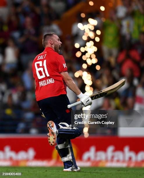 Phil Salt of England celebrates reaching his century during the 1st T20 International between the West Indies and England at Kensington Oval on...