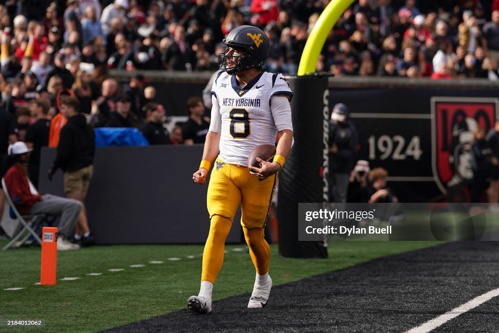 Marchiol Nicco Marchiol of the West Virginia Mountaineers celebrates after ...