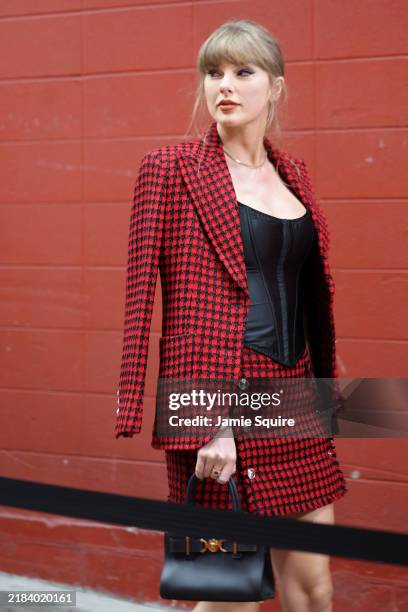 Taylor Swift looks on prior to a game between the Kansas City Chiefs and the Denver Broncos at GEHA Field at Arrowhead Stadium on November 10, 2024...